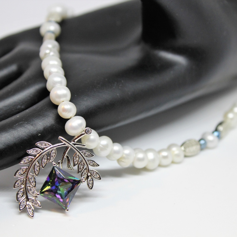Delicate pearl necklace with rainbow topaz pendant